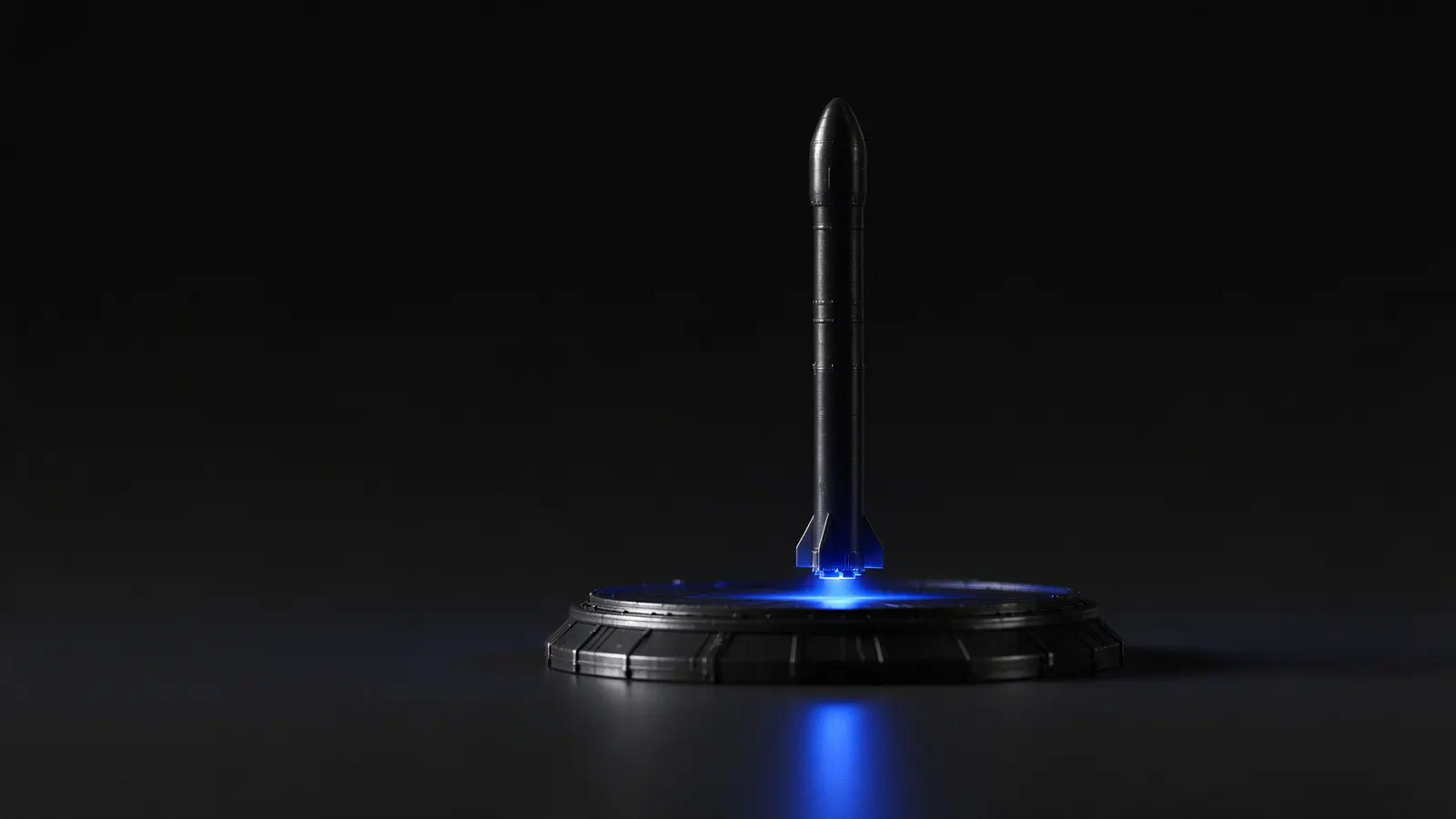 Maquete de foguete preto numa base de lançamento iluminada